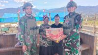 Satgas Yonif 323 Buaya Putih Kembali Membuat Masyarakat Papua Gembira