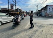 Polsek Bahodopi  Tertibkan Arus Lalu Lintas dan Tingkatkan Keselamatan Pengguna Jalan di Bahodopi