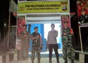 Jelang Nataru,Babinsa Koramil 1311-03 Bersama Kepolisian Morowali Utara Pengamanan Pos Keamanan Wilayah 