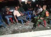 Babinsa Koramil 1311-02  Komsos  Bersama Warga Bahomakmur 