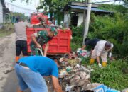 Koramil 1311-09/Bahodopi Kerja Bakti, Bersihkan Sampah di Desa Bahomakmur