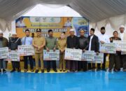 Bupati Iksan,Launching Inovasi Bansos dan Hibah Iklas Juara serta Layanan Jemput Sakit Pulang Sehat di Bungku Tengah