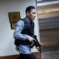 A member of the Senate security walks, after gunshots were heard at the Philippine Senate, as chaos mounted in anticipation of an attempt to arrest a top senator wanted by the International Criminal Court, in Pasay City, Metro Manila, Philippines, May 13, 2026. REUTERS/Eloisa Lopez