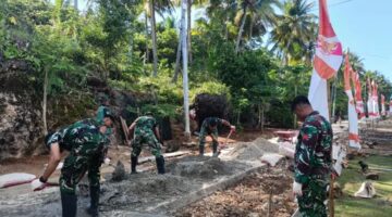 Semangat Gotong royong,Satgas TMMD Ke-129 Bersama Warga  Percepat Pekerjaan  Rabat Beton Jalan